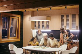 Family playing board game at home