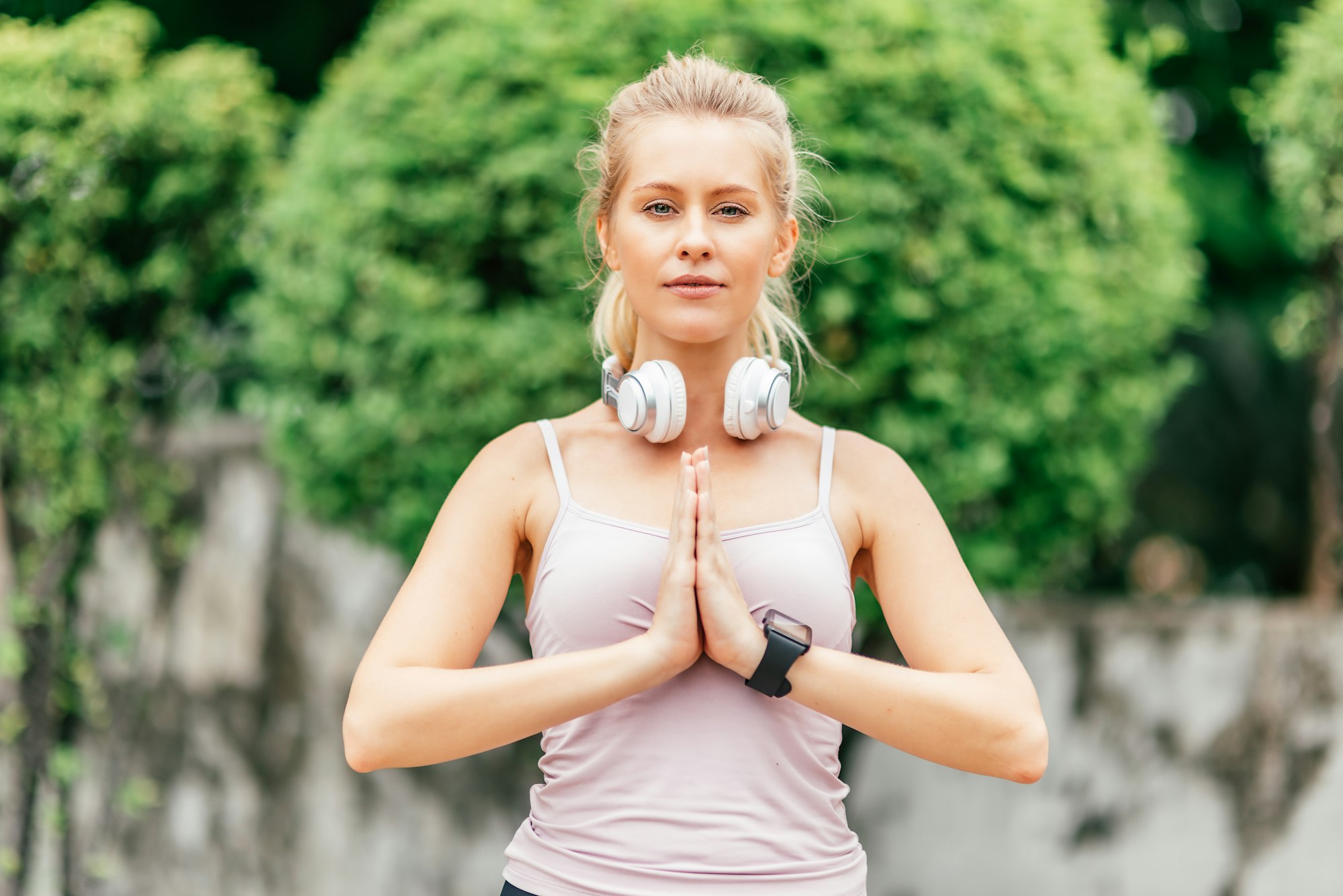 Focused and motivated. Fitness girl having workout outdoors.