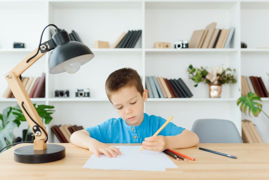 Kid preparing for school at home