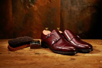 Still life with men's leather shoes and accessories for shoes ca